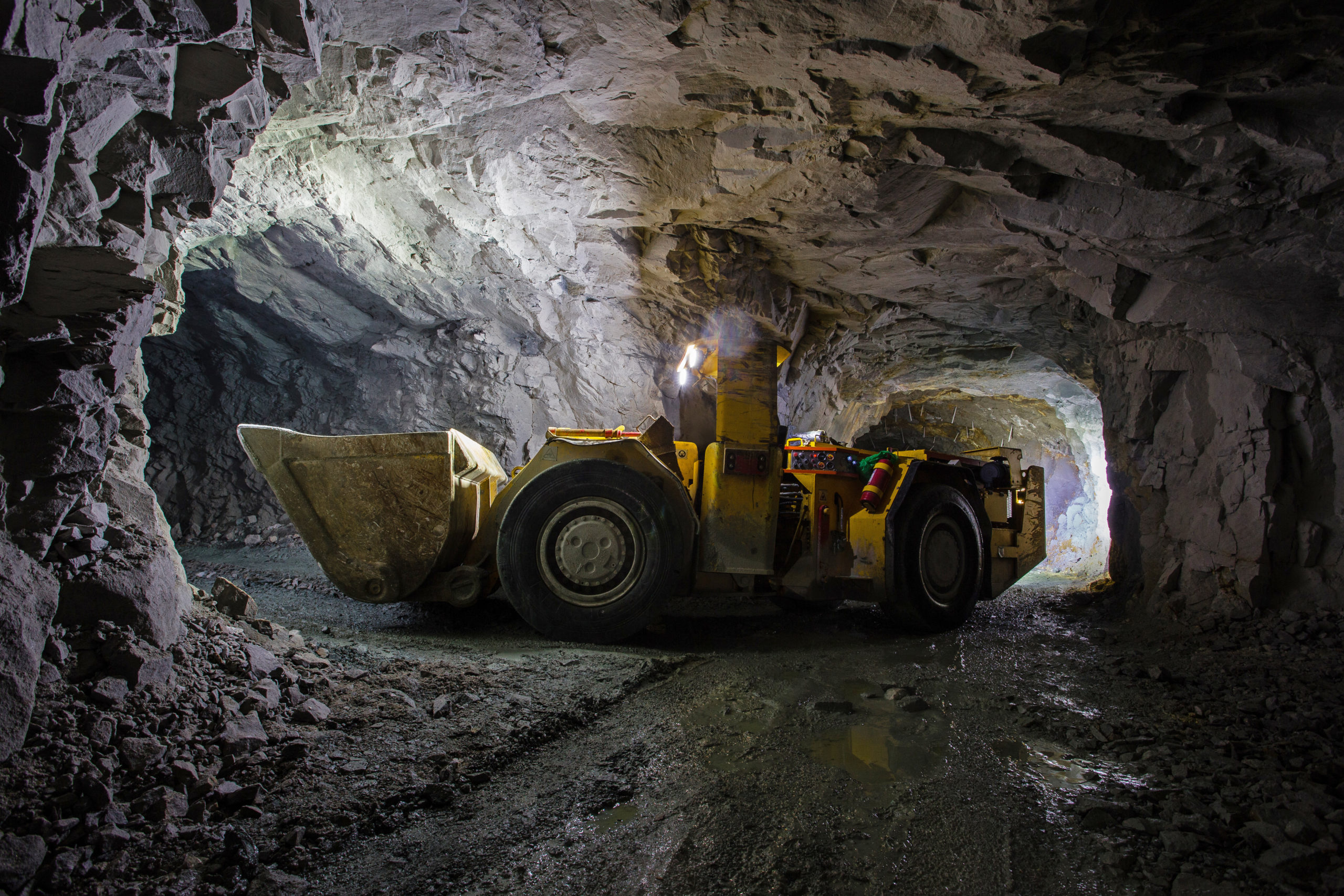 Underground gold ore mine shaft tunnel gallery passage with load