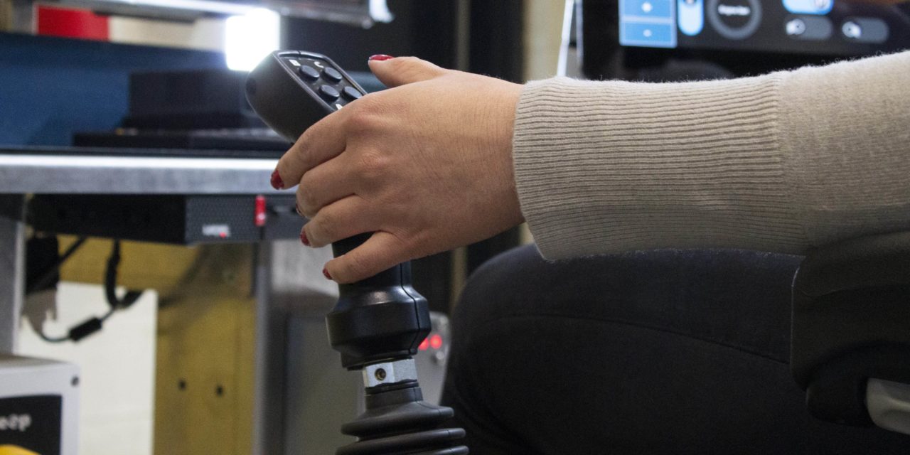 Operator's hand on a TeleOp Joystick