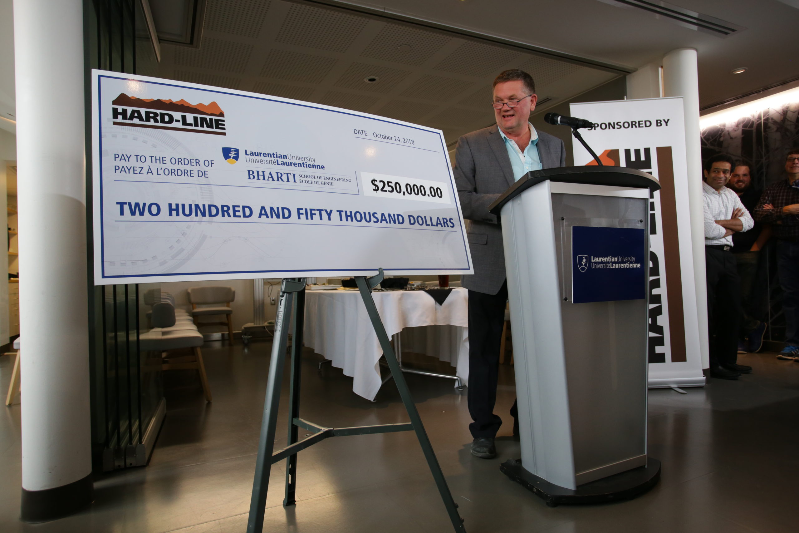 Walter Presenting $250,000 cheque to Laurentian University